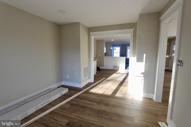 hallway featuring hardwood / wood-style floors