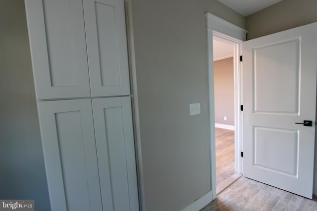 hallway featuring light hardwood / wood-style floors