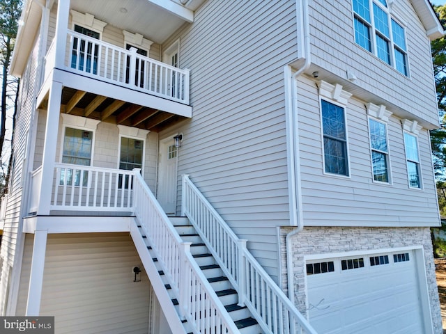 view of exterior entry featuring a garage