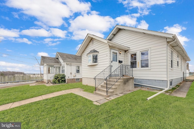 view of front of house with a front lawn