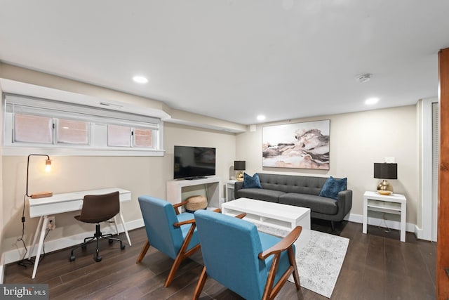 living room featuring dark hardwood / wood-style flooring