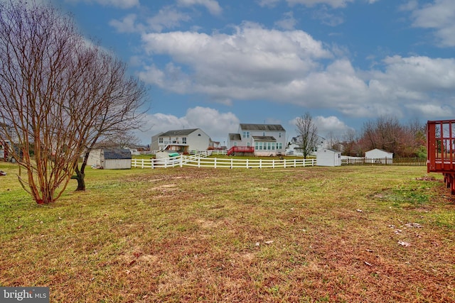 view of yard with a storage shed