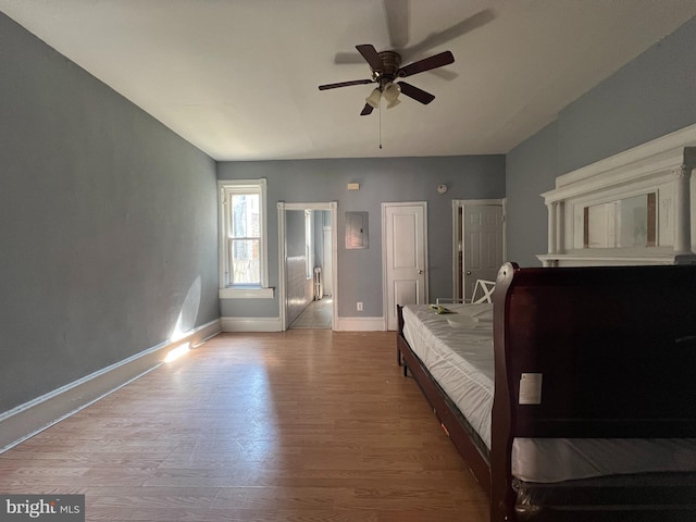 bedroom featuring ceiling fan and light wood-type flooring