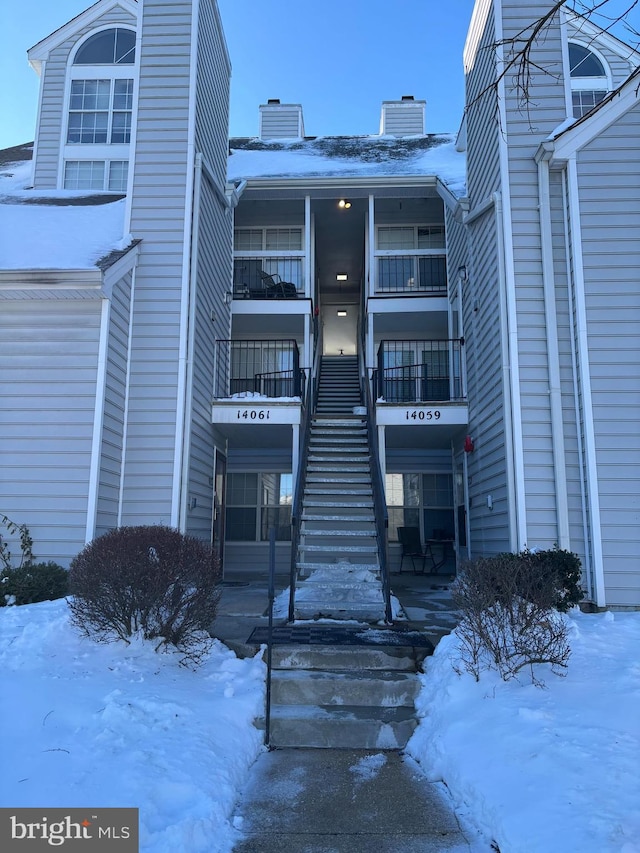 view of snow covered property