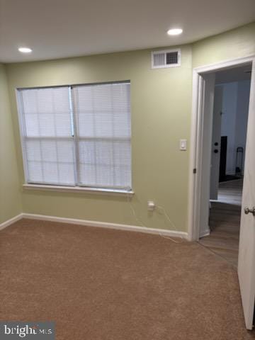 empty room with carpet floors