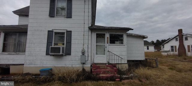 view of front facade with cooling unit