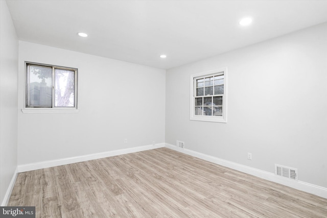 empty room with light wood-type flooring