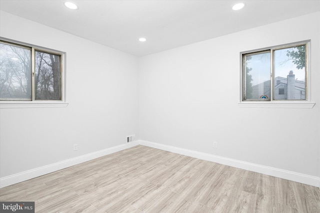 empty room with light wood-type flooring