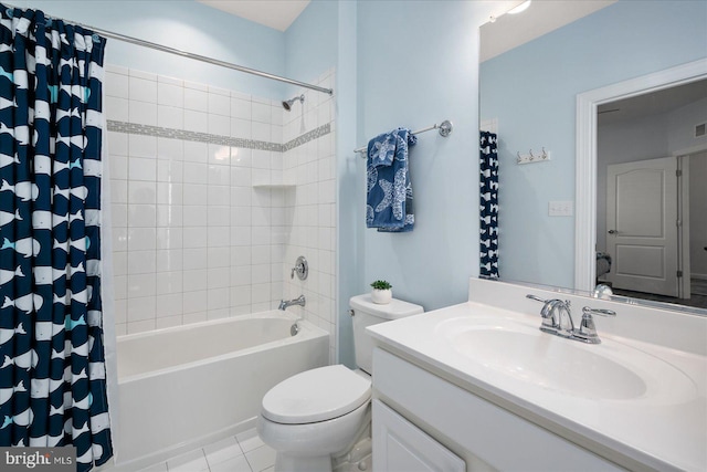 full bathroom with tile patterned flooring, vanity, toilet, and shower / tub combo