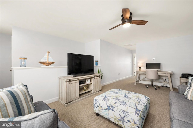 living room featuring ceiling fan and light colored carpet