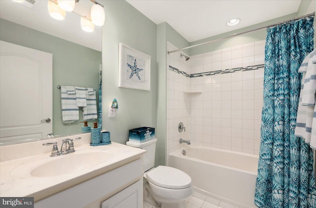 full bathroom featuring tile patterned flooring, vanity, toilet, and shower / bathtub combination with curtain