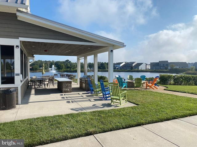 view of patio / terrace featuring a water view and central air condition unit