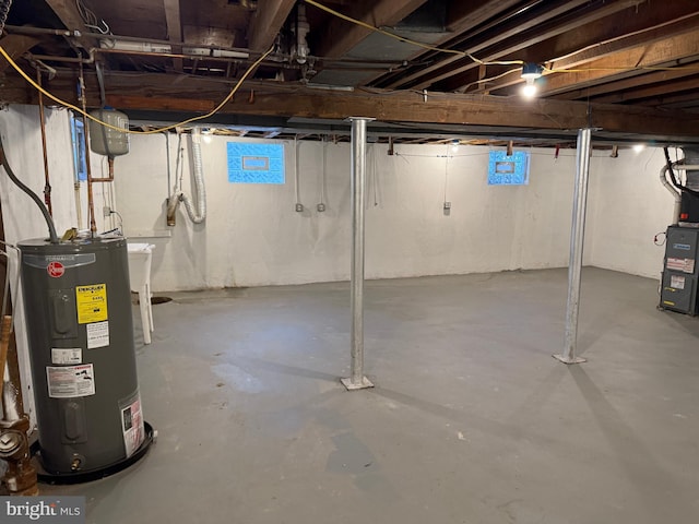 basement featuring electric water heater