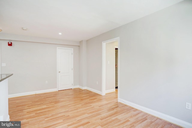 unfurnished room featuring light hardwood / wood-style flooring