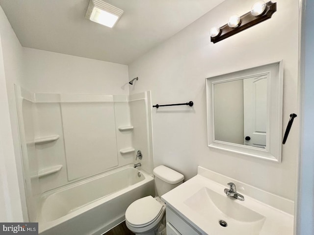 bathroom featuring  shower combination, vanity, and toilet