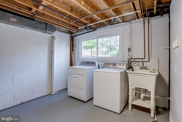 clothes washing area featuring washing machine and dryer