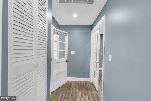 doorway featuring light hardwood / wood-style floors