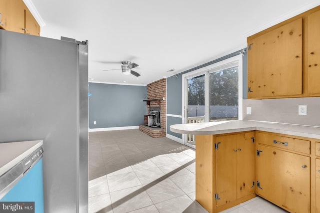 kitchen with kitchen peninsula, stainless steel fridge, ornamental molding, ceiling fan, and light tile patterned flooring