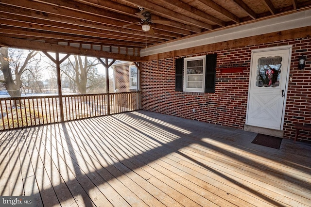 wooden deck with ceiling fan