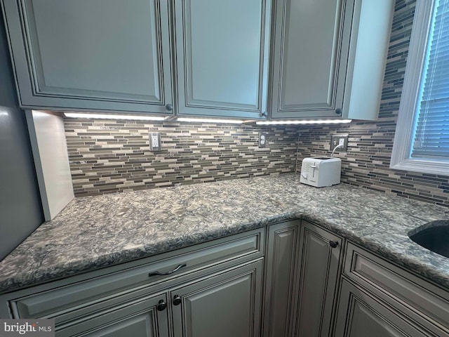 kitchen featuring backsplash