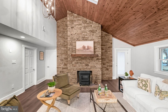 living room featuring a wood stove, high vaulted ceiling, an inviting chandelier, hardwood / wood-style flooring, and wood ceiling