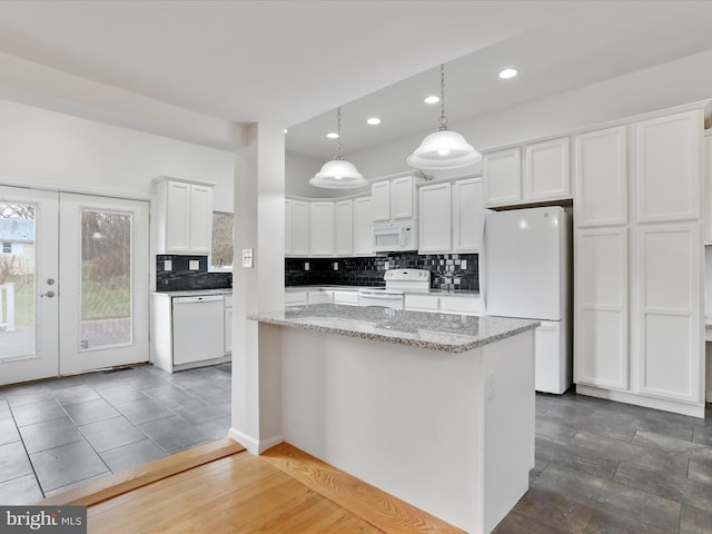 kitchen with light stone countertops, french doors, white appliances, pendant lighting, and white cabinetry