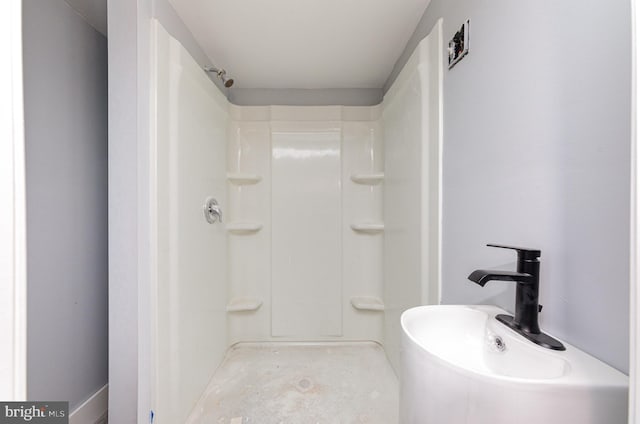 bathroom with walk in shower