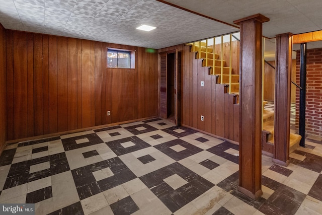 basement with wood walls