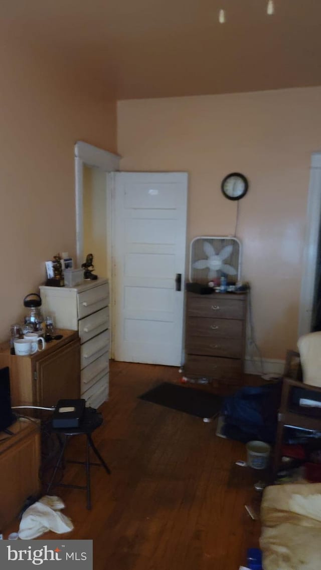 bedroom featuring dark hardwood / wood-style floors