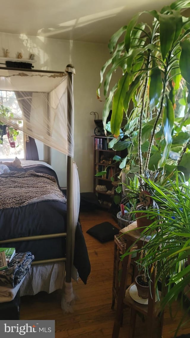 bedroom featuring hardwood / wood-style flooring