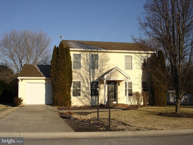 colonial house featuring a garage