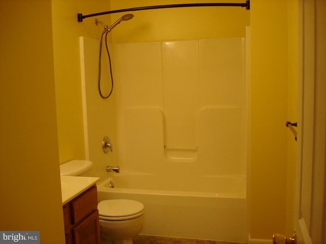 full bathroom featuring tile patterned floors, vanity, shower / bathtub combination, and toilet