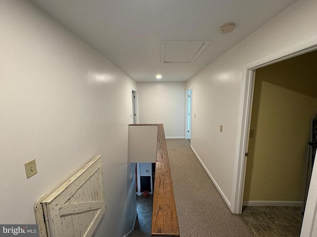 hallway featuring carpet