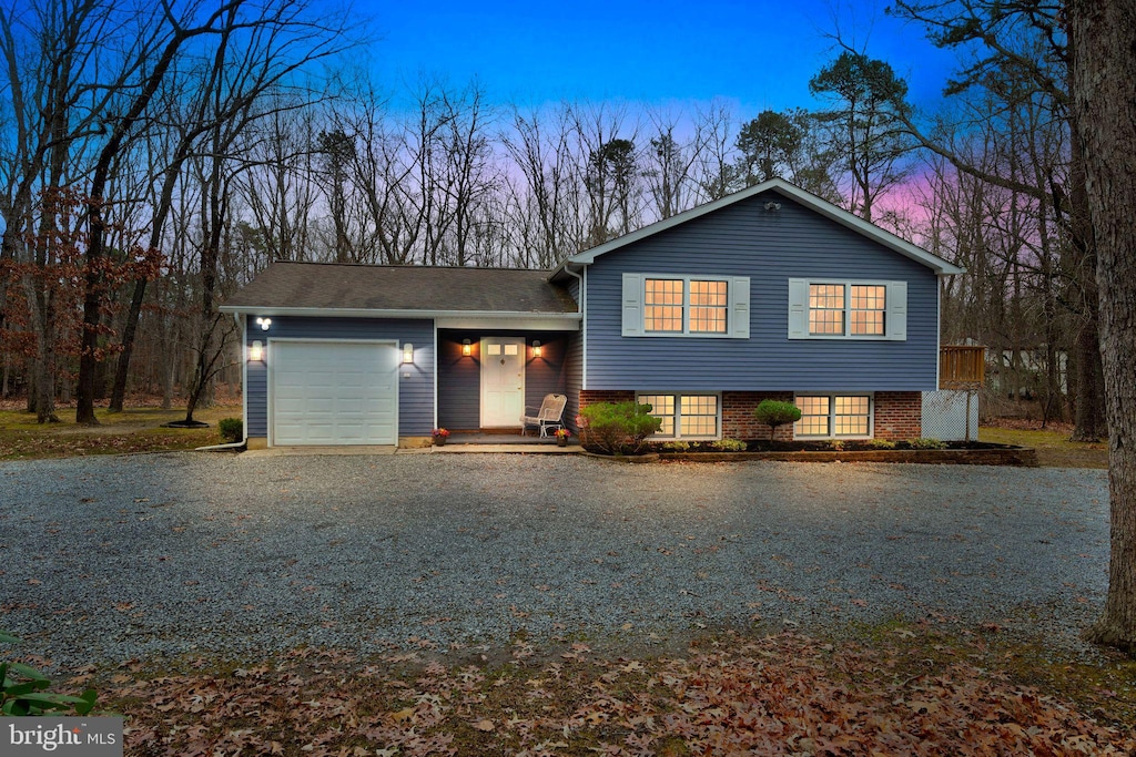 split level home with a garage