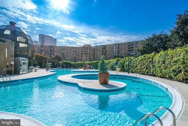 pool featuring a view of city