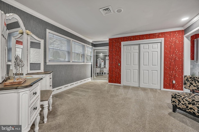 sitting room featuring crown molding, carpet, and a baseboard radiator