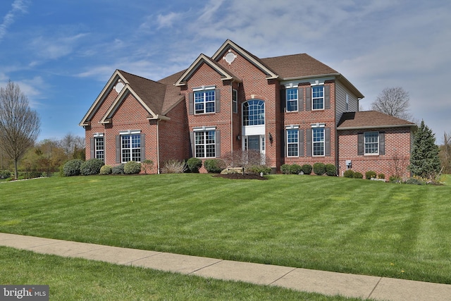 view of front facade with a front yard