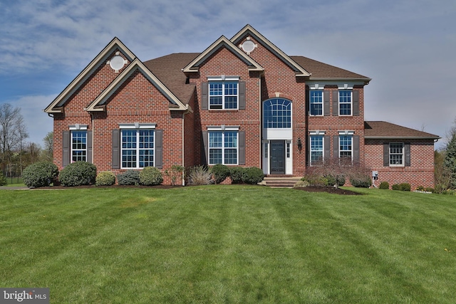 view of front facade with a front lawn