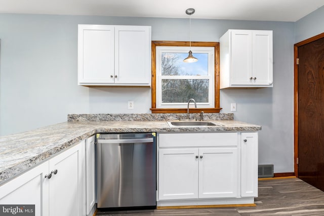 kitchen with dishwasher, sink, hanging light fixtures, dark hardwood / wood-style floors, and white cabinets