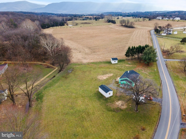 bird's eye view with a mountain view and a rural view