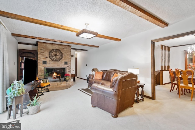 living room featuring beam ceiling, light carpet, and a textured ceiling