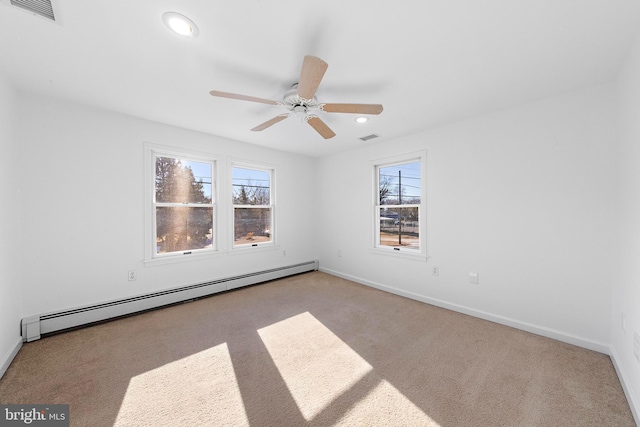 empty room featuring ceiling fan, light carpet, and a baseboard radiator