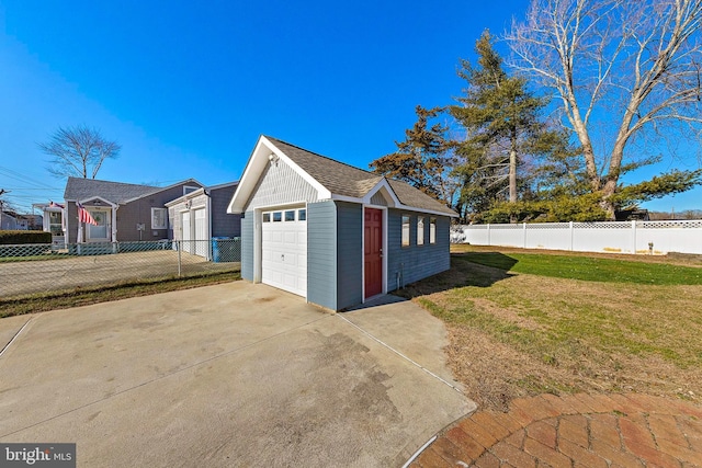 garage with a lawn