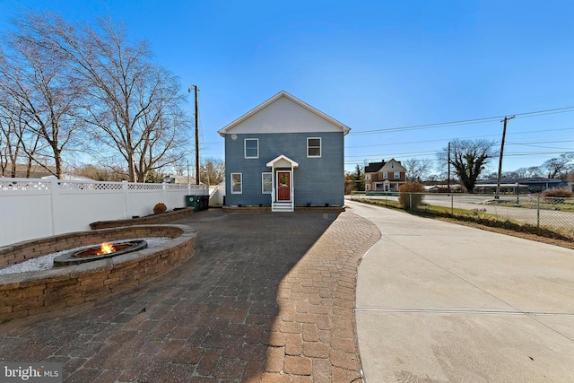 exterior space with a fire pit