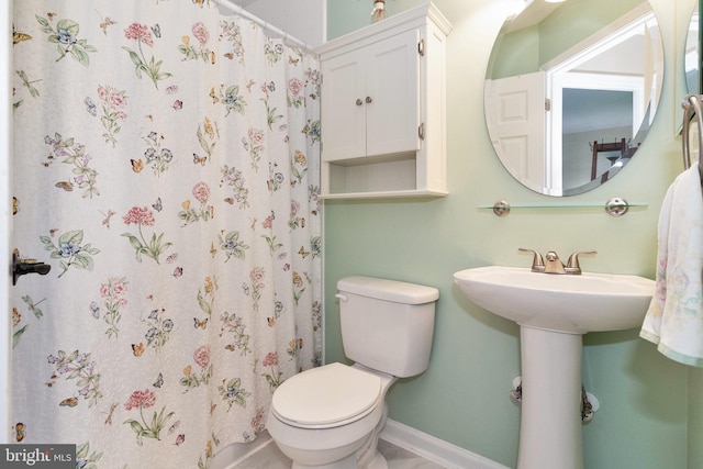 bathroom featuring toilet