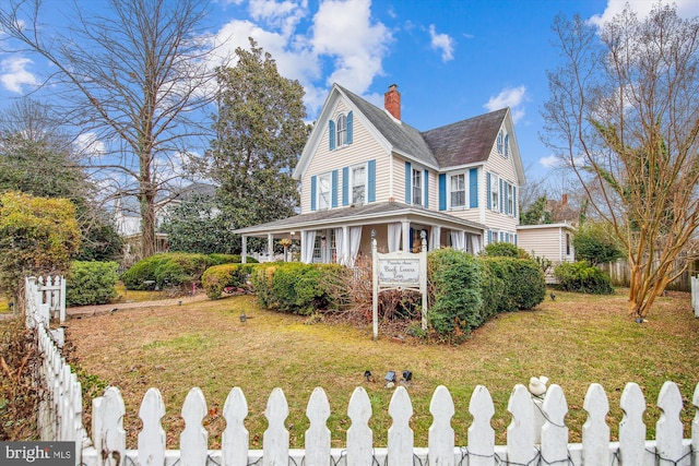 view of property exterior featuring a lawn