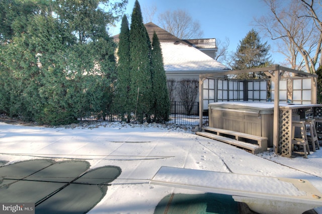 exterior space featuring a hot tub