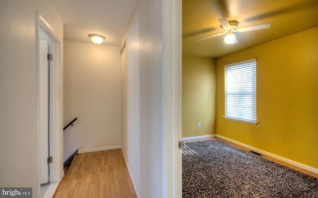 corridor featuring light hardwood / wood-style flooring