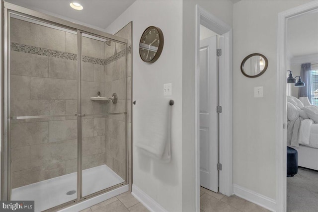 bathroom featuring tile patterned floors and walk in shower