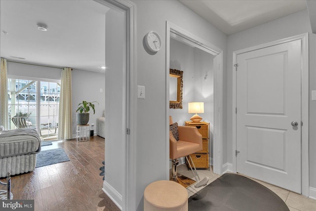 entrance foyer with light wood-type flooring